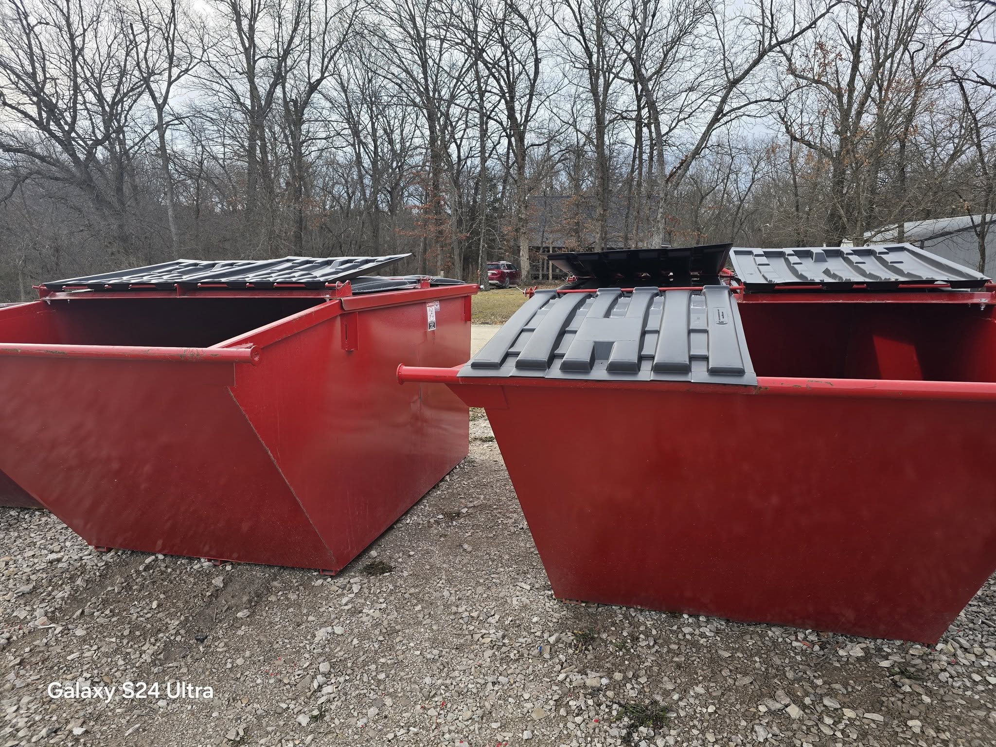 J&S Trash 4-yard and 6-yard dumpsters at the yard