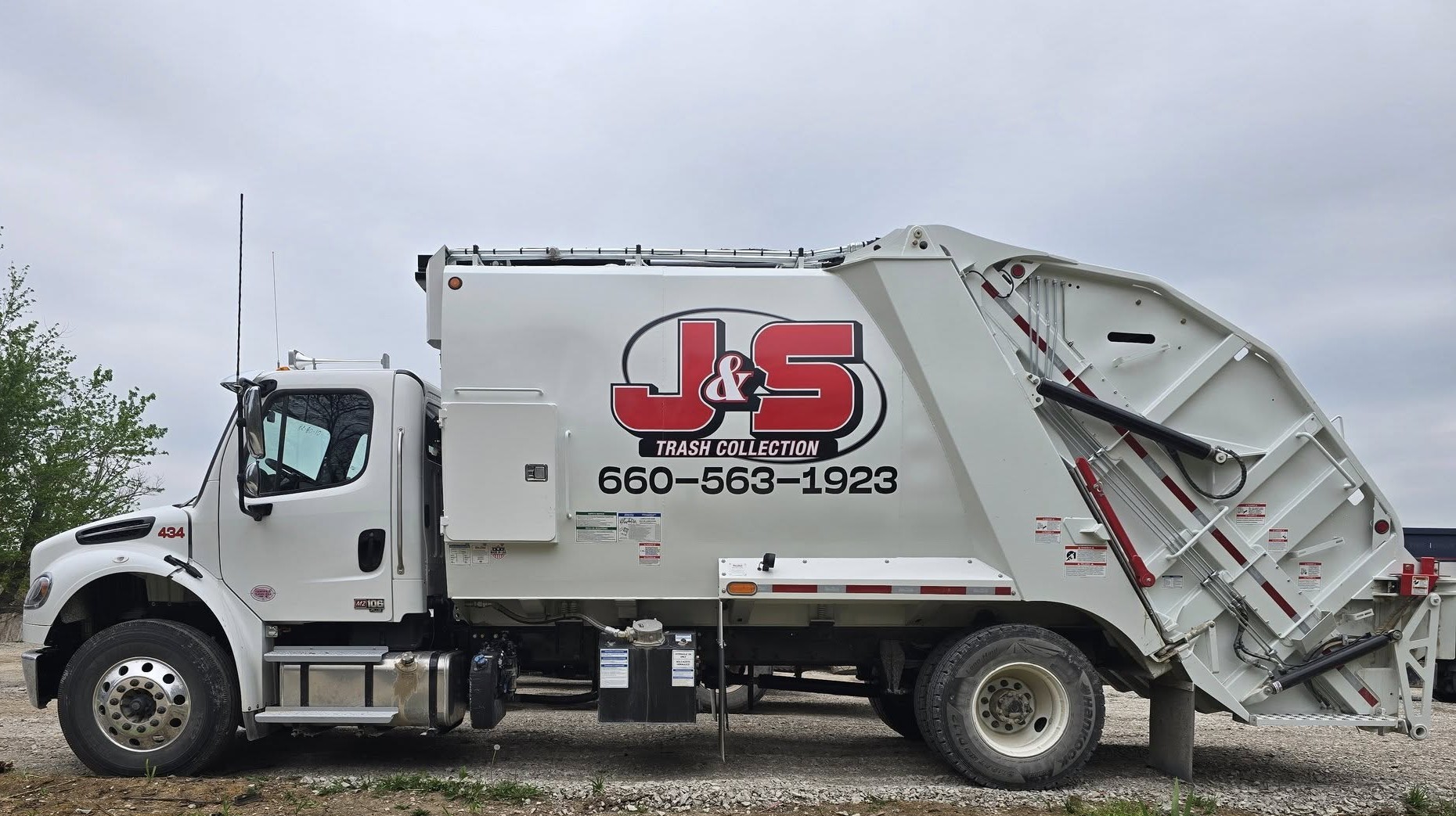 J&S Trash collection truck
